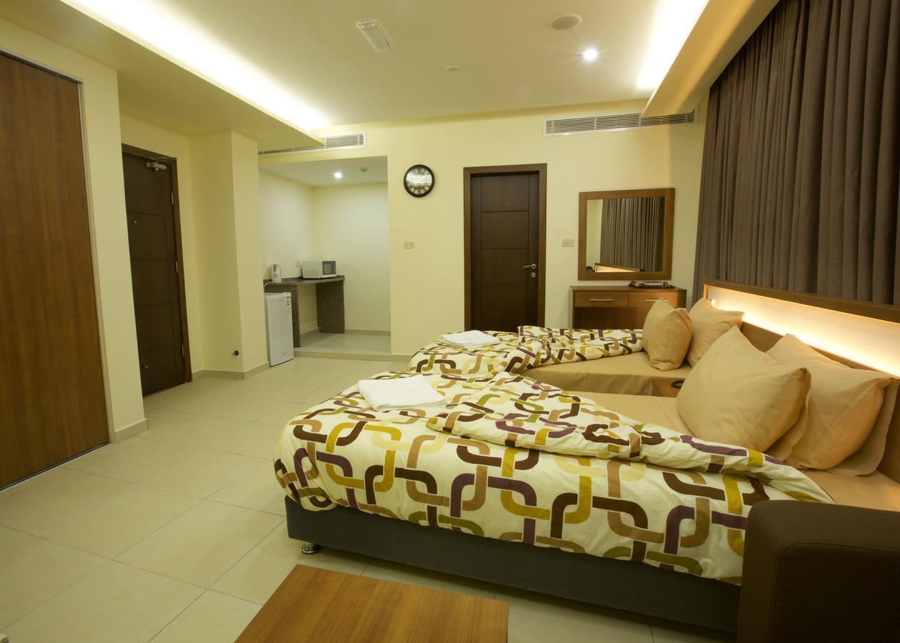 Lujain Hotel فندق النور واللجين Ammán Szoba fotó